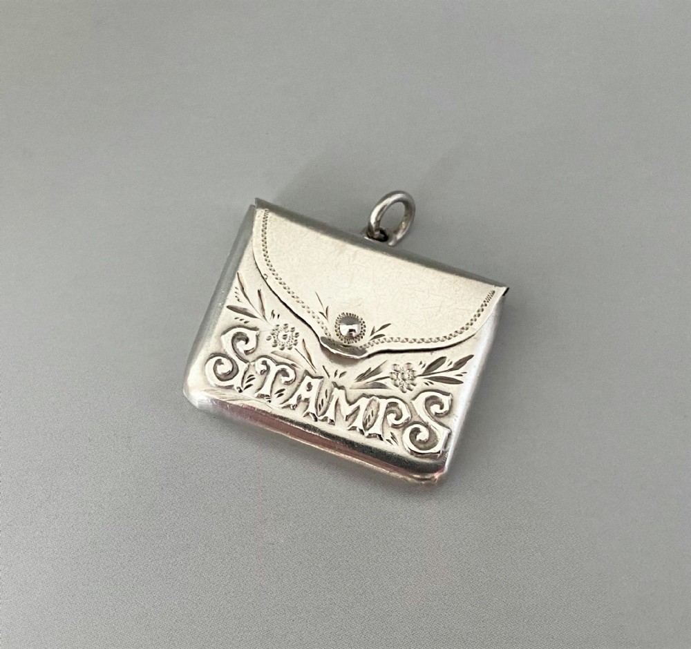 A gorgeous Edwardian silver stamps case