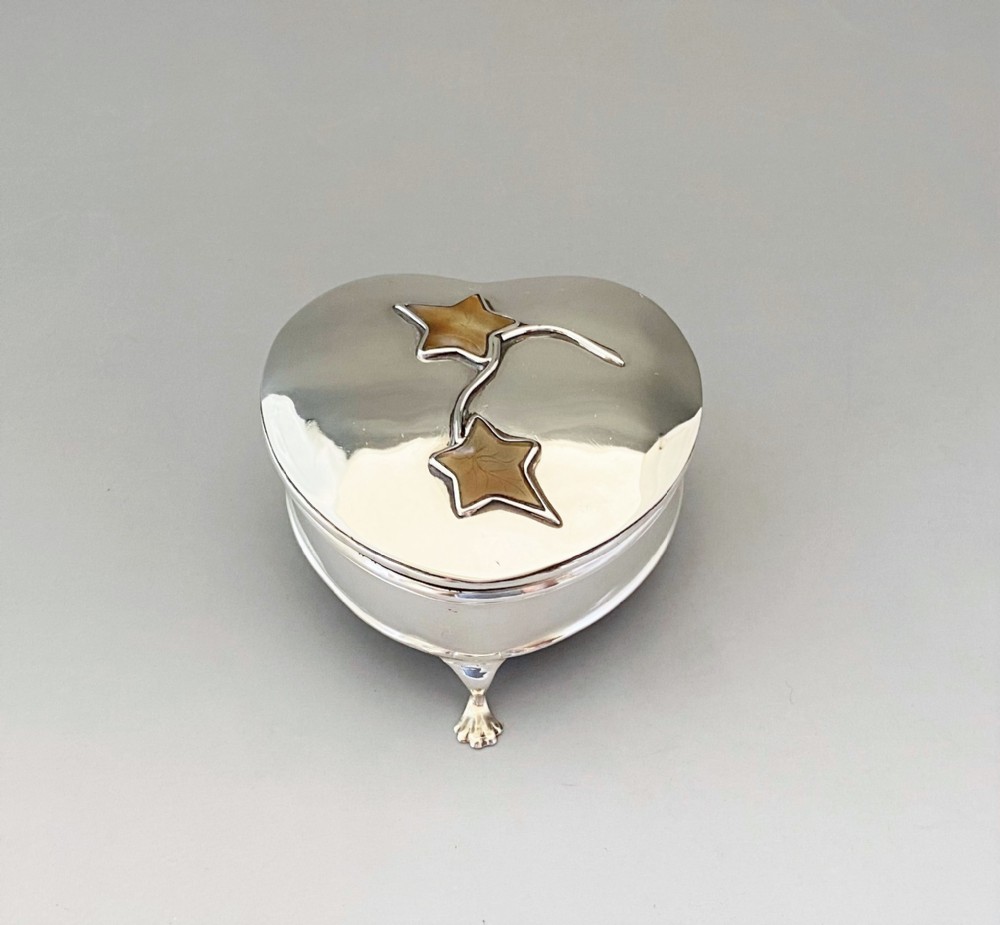 A stunning heart shaped silver & mother-of-pearl trinket box