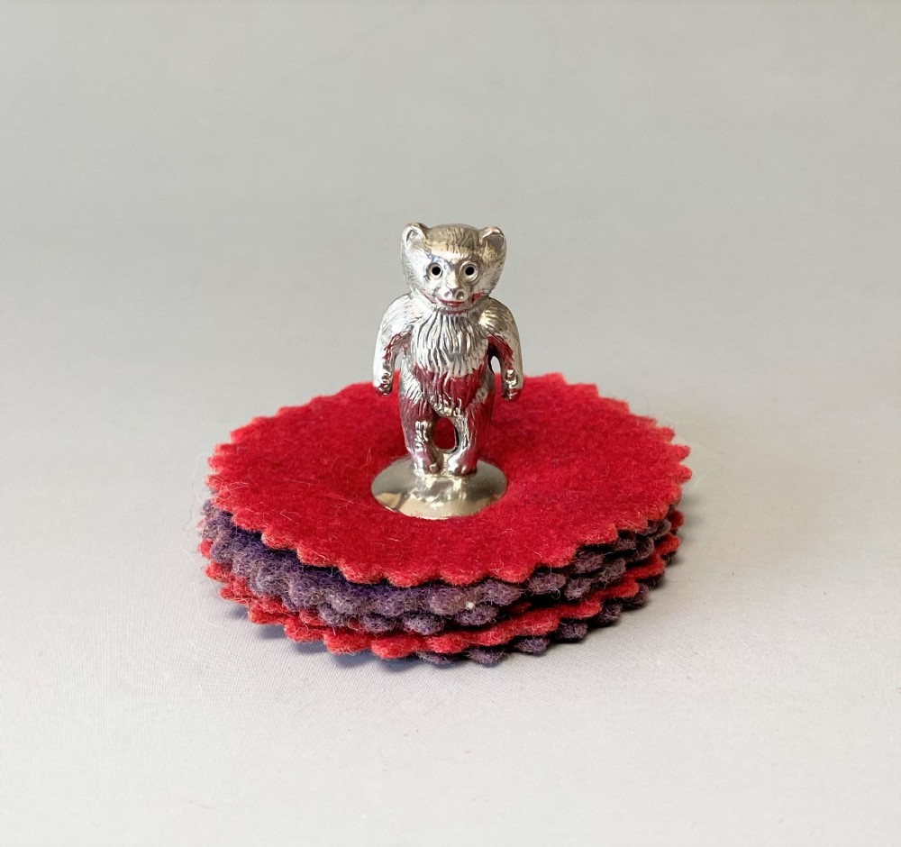 An unusual Edwardian silver Teddy Bear pen wipe