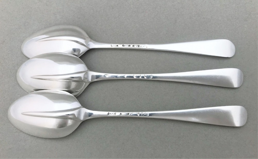 A rare set of three 18th Century silver dessert spoons View IV