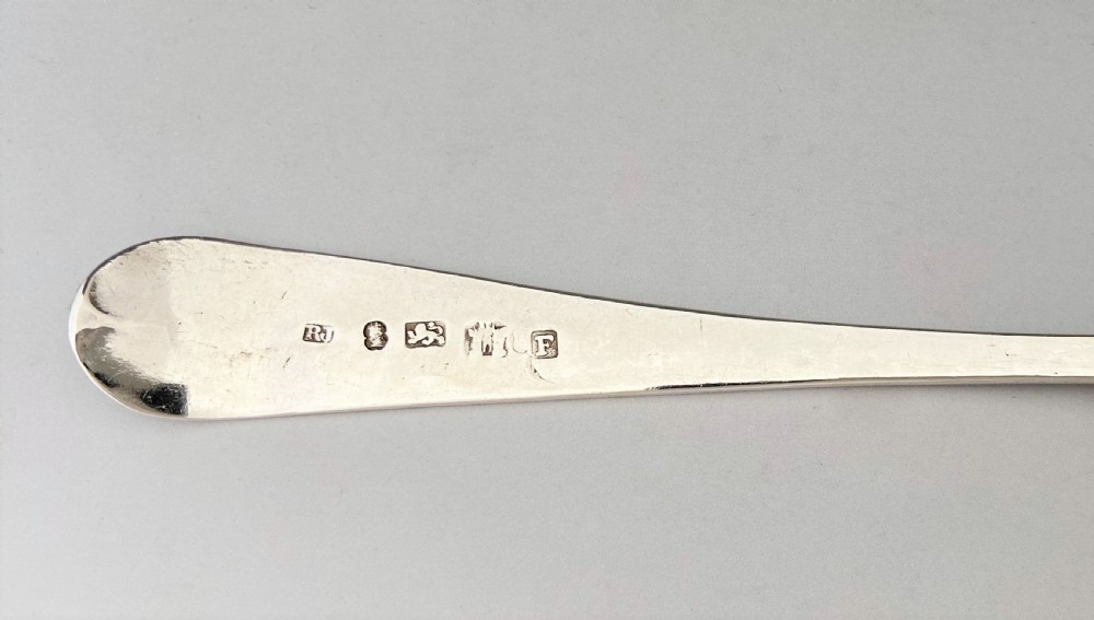 A bright cut Exeter silver table or serving spoon View IV