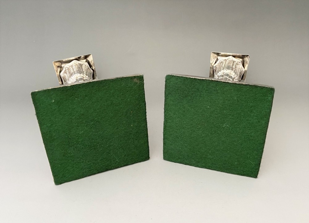 A stunning pair of late Victorian silver candle sticks View VI