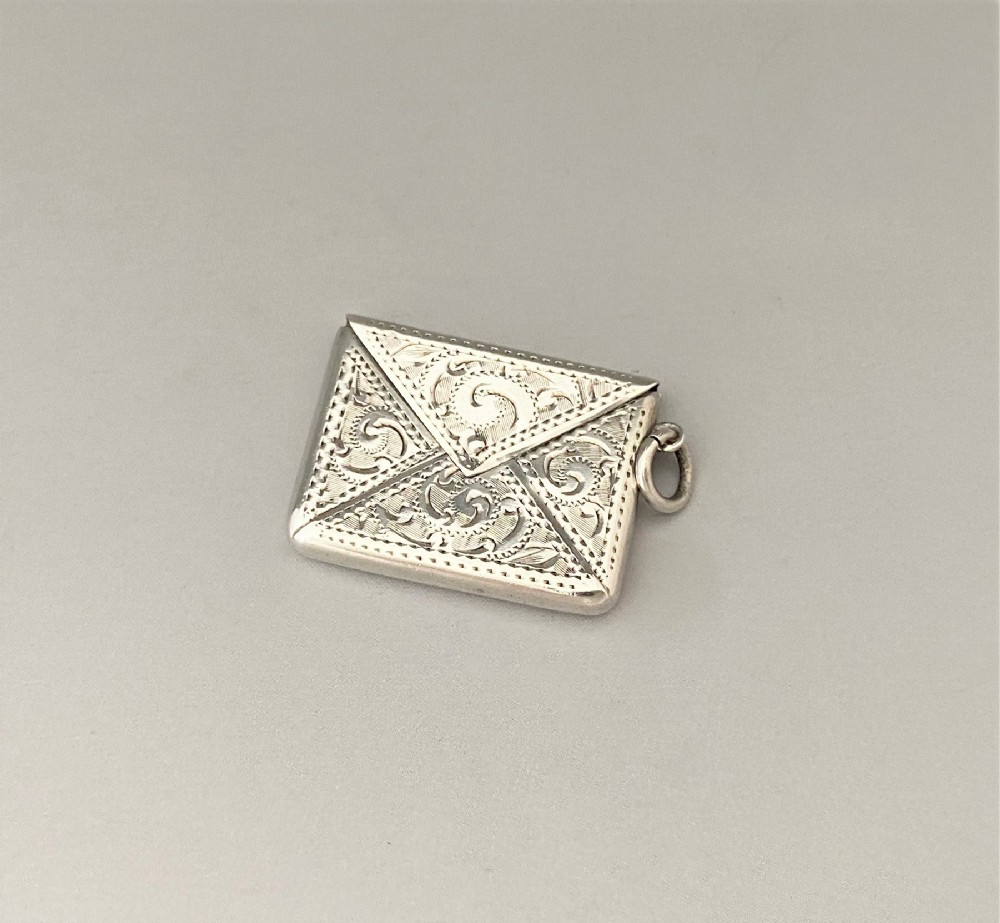 A delightful Edwardian silver stamp 'envelope'