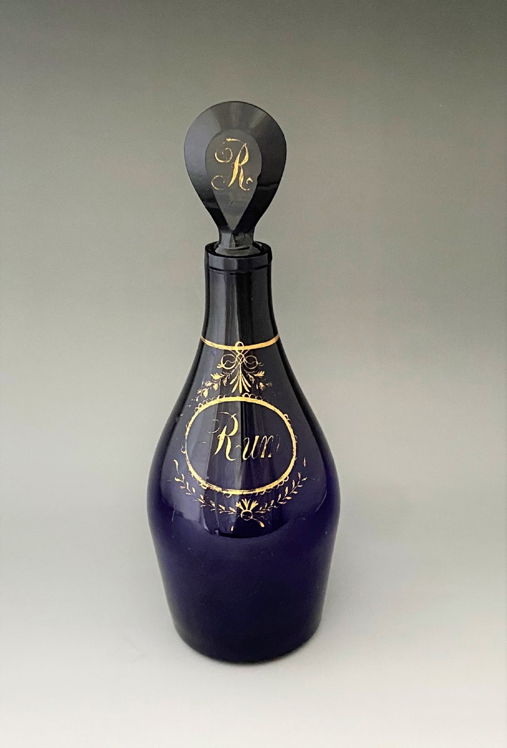 A rare Georgian Bristol Blue Rum decanter