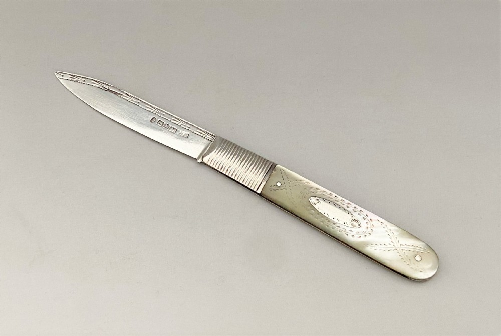 An early William IV silver & mother-of-pearl fruit knife