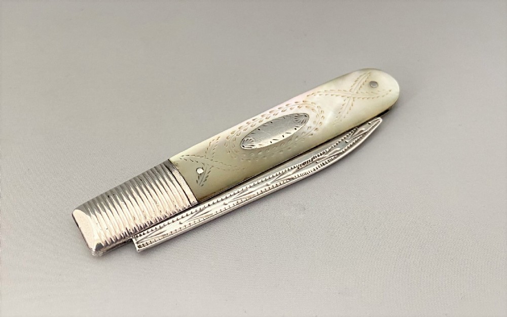 An early William IV silver & mother-of-pearl fruit knife View V