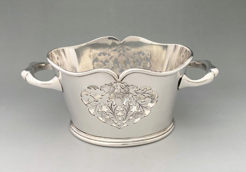A fabulous cut glass decanter with silver plated holder View VIII