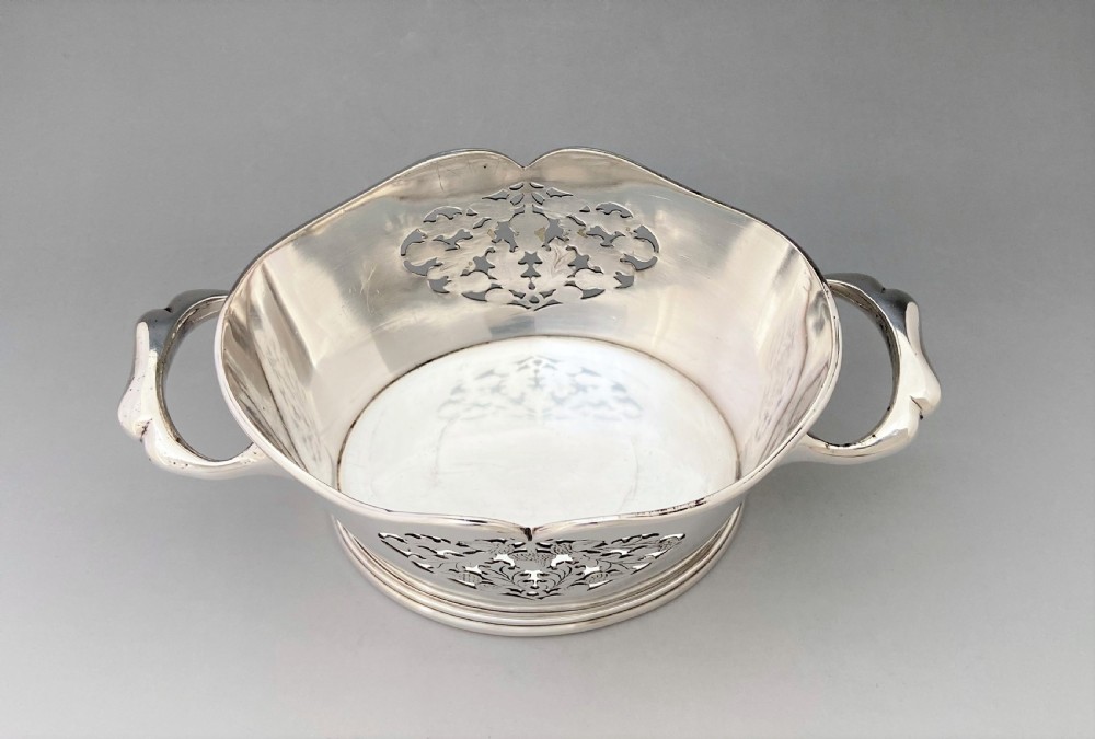 A fabulous cut glass decanter with silver plated holder View IX