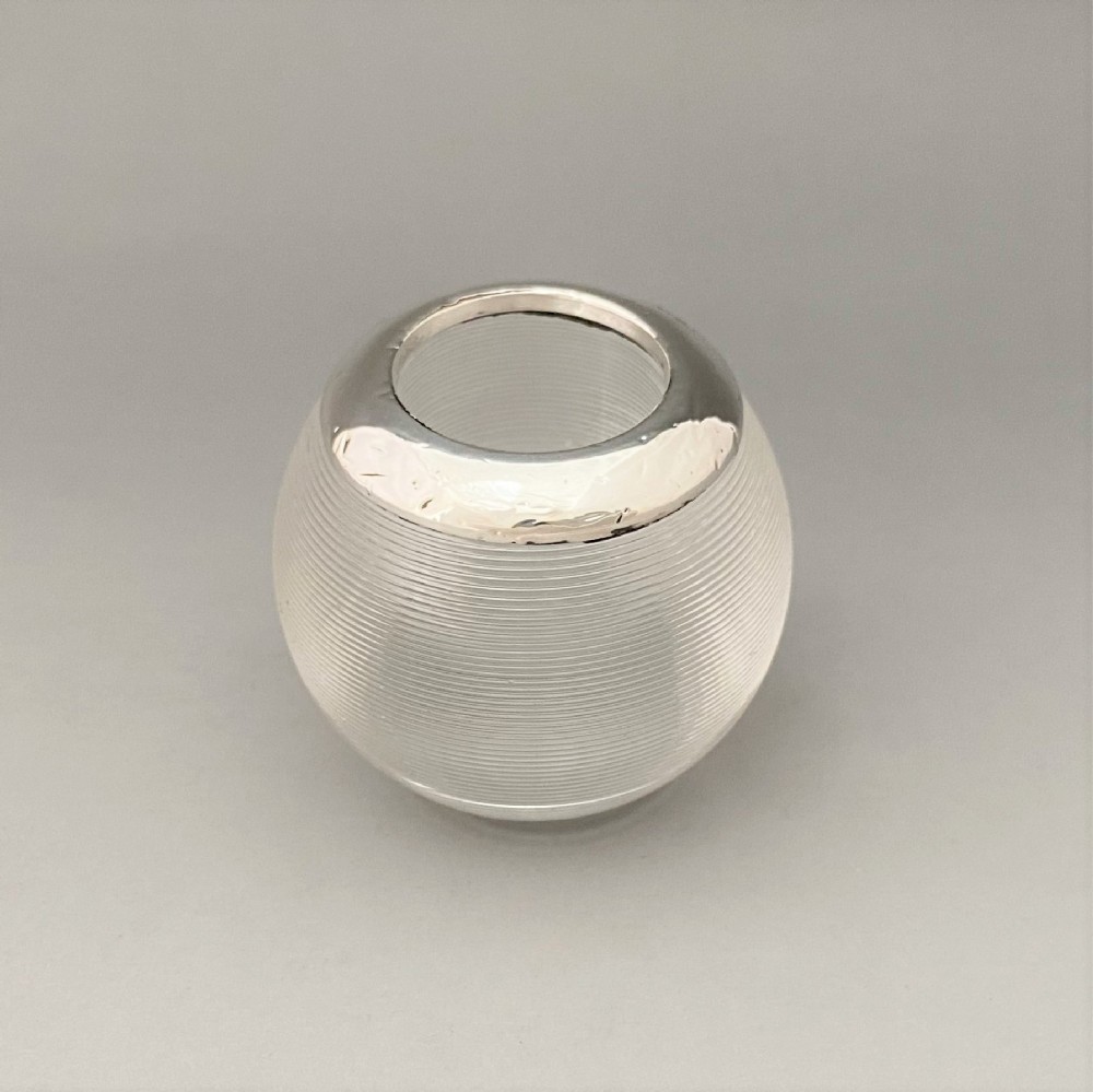 A handsome Edwardian silver mounted match striker