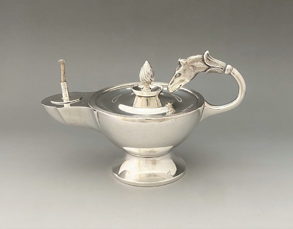A fabulous silver 'horse head' table lighter