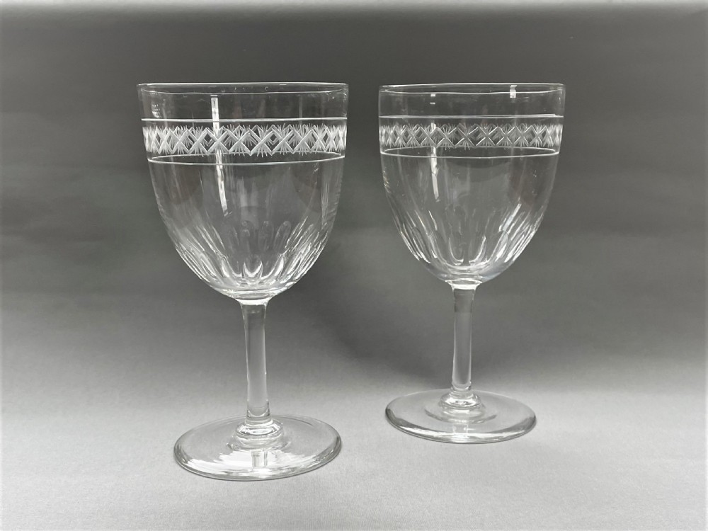 A handsome pair of cut & etched Victorian wine goblets