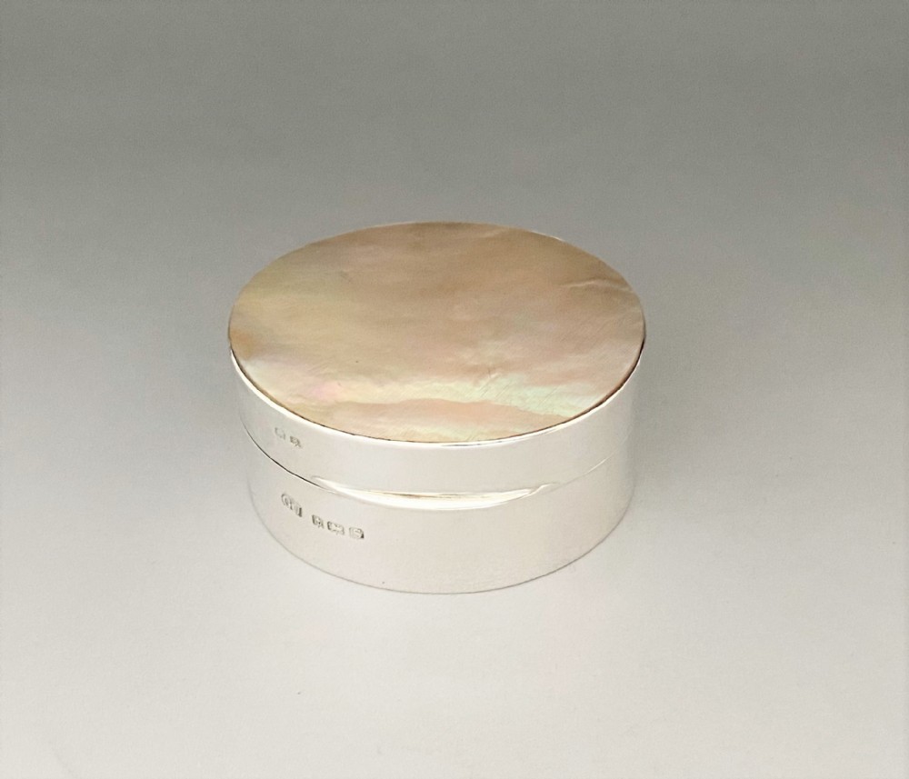 An unusual silver & mother-of-pearl small trinket box