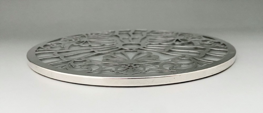 A Gorgeous George V silver teapot stand or coaster View III