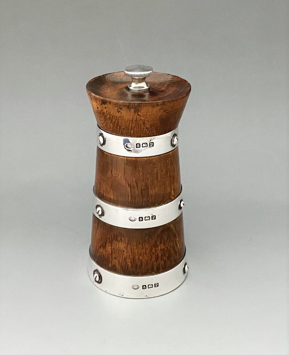 A lovely George V silver mounted pepper grinder