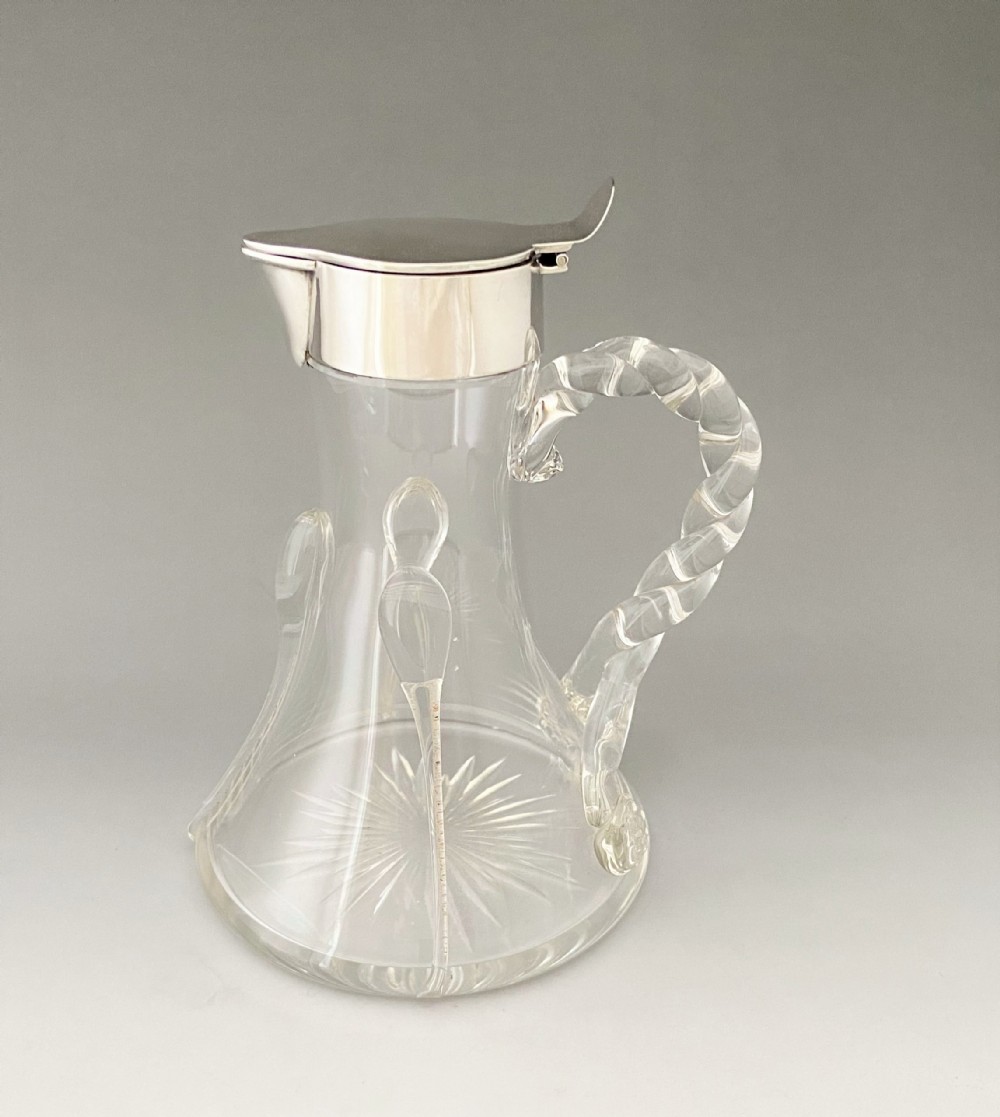 A Fabulous Edwardian Silver Mounted Whisky Jug