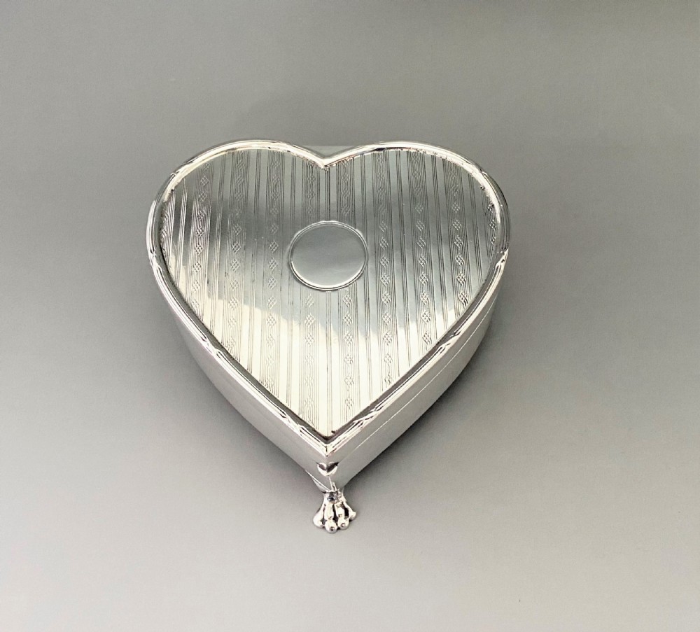 A fabulous George V heart shaped silver trinket box