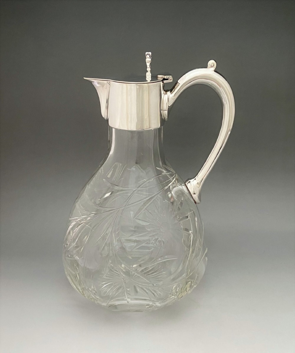 A stunning Victorian silver plated & glass claret jug