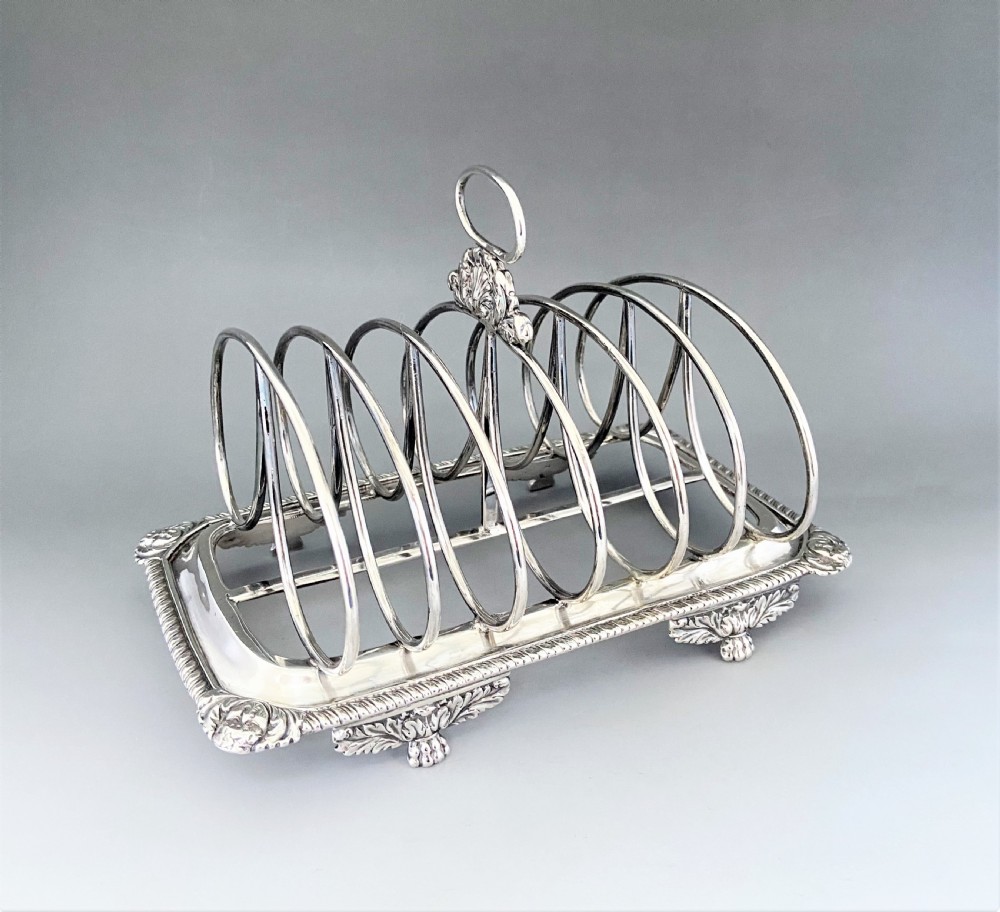 An outstanding and imposing Georgian silver toast rack