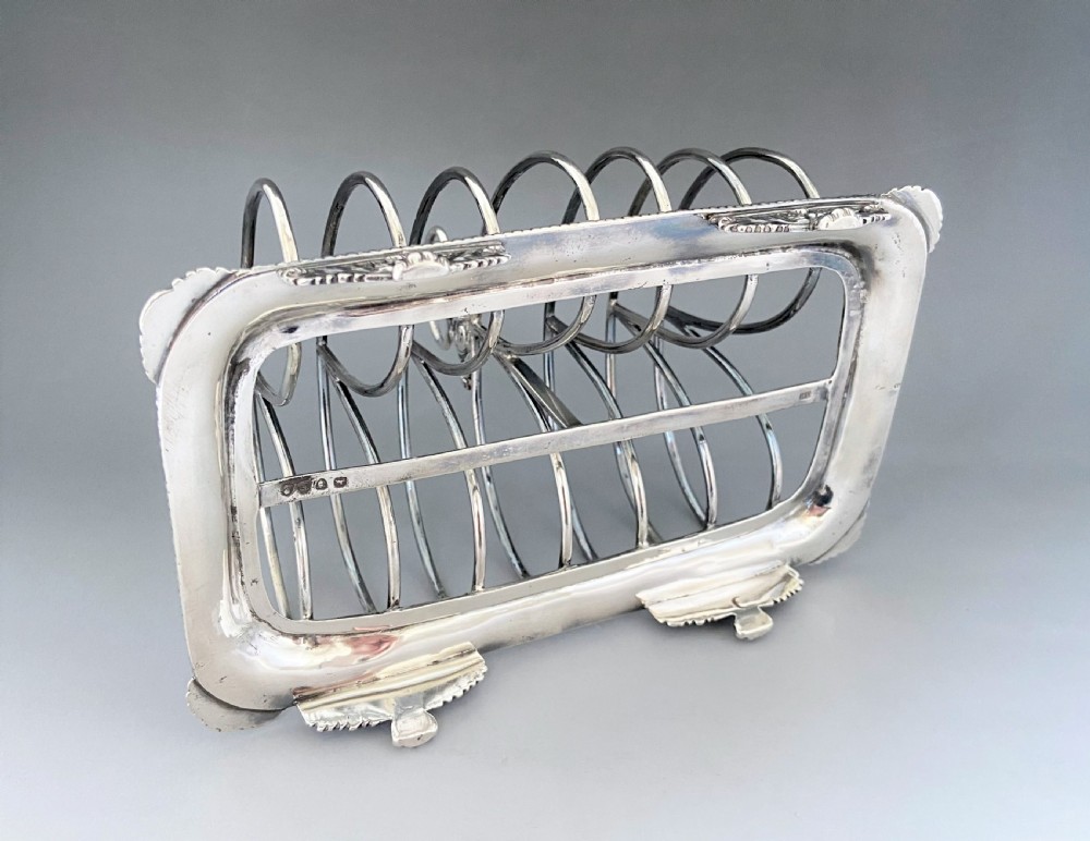 An outstanding and imposing Georgian silver toast rack View X