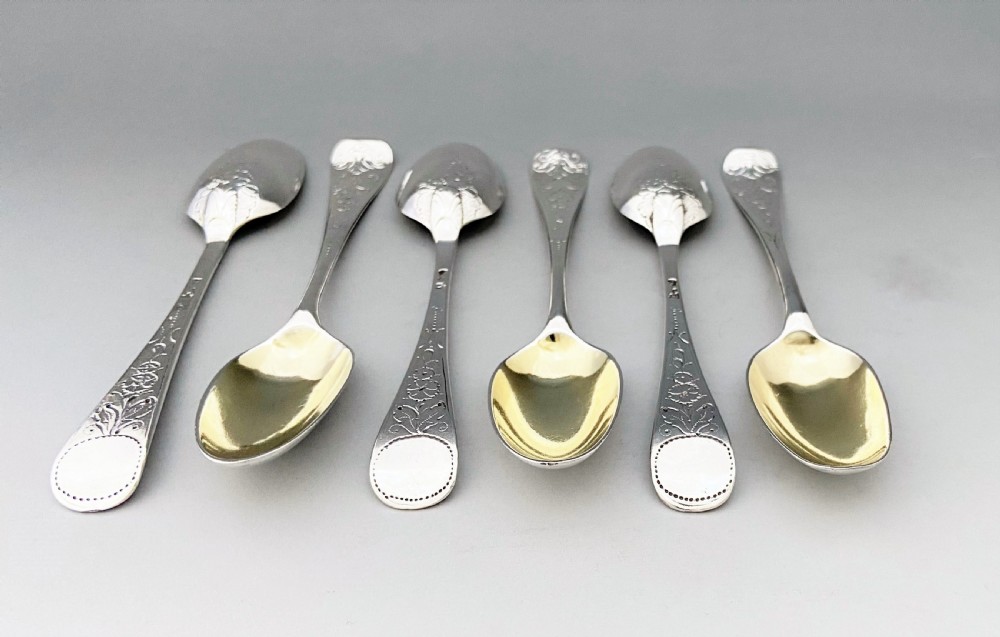 A superb set of 6 mid 18th Century silver gilt teaspoons View X