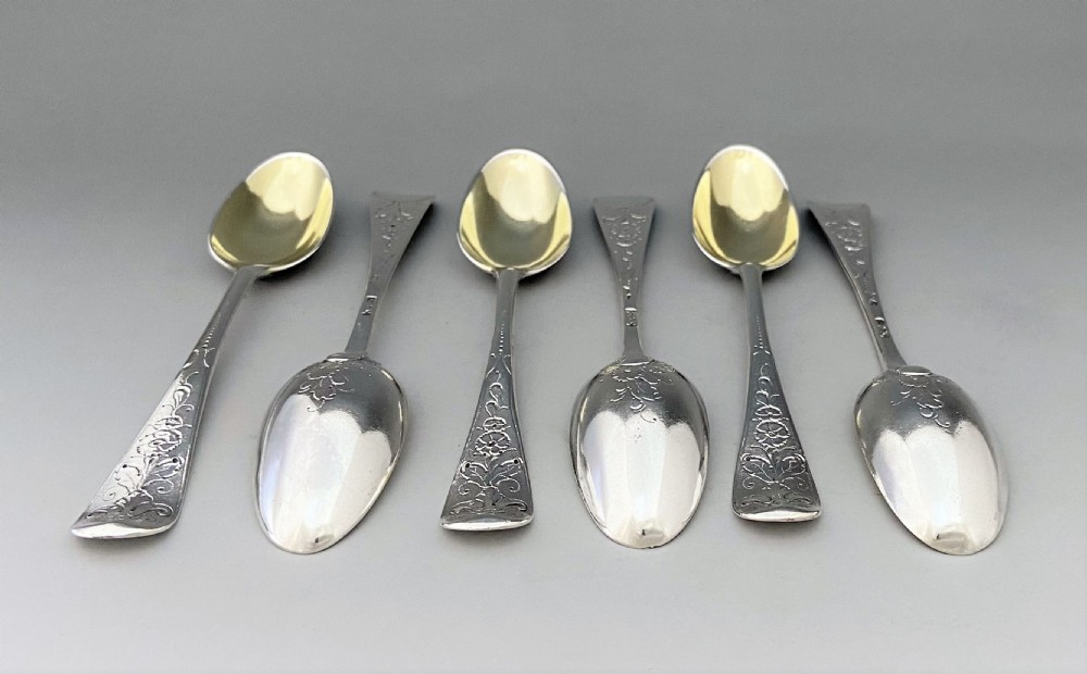 A superb set of 6 mid 18th Century silver gilt teaspoons View XI