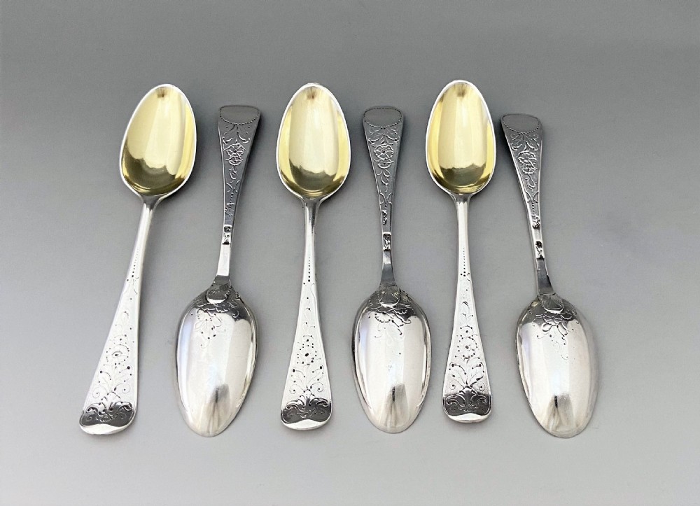 A superb set of 6 mid 18th Century silver gilt teaspoons View XII