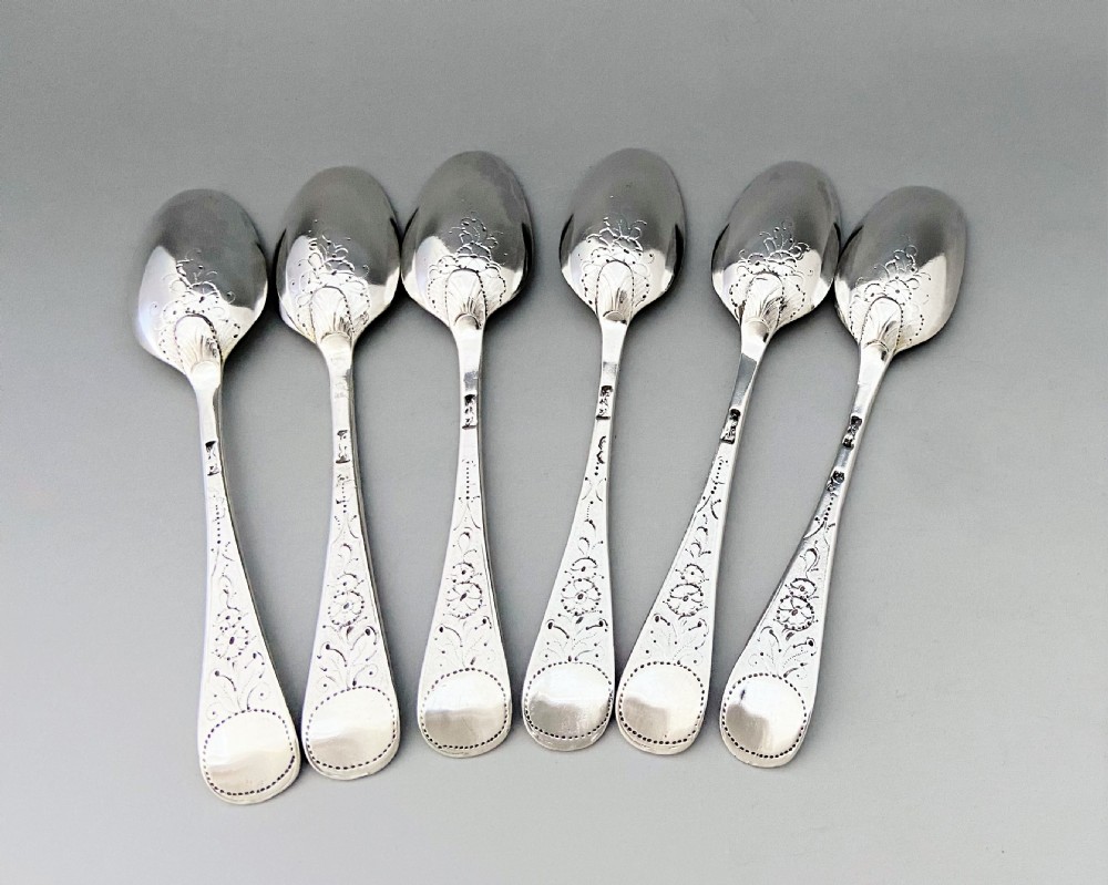 A superb set of 6 mid 18th Century silver gilt teaspoons View XIII