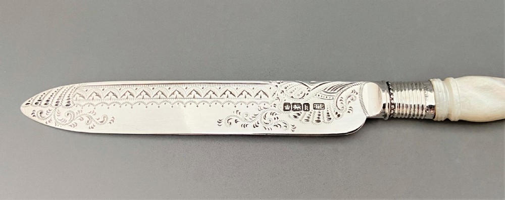 A gorgeous Edwardian silver & mother-of-pearl cake knife View V