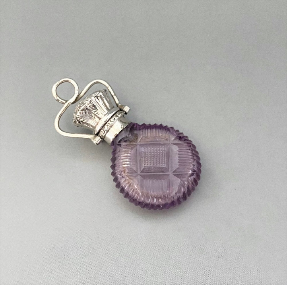 A stunning small silver mounted Victorian scent bottle