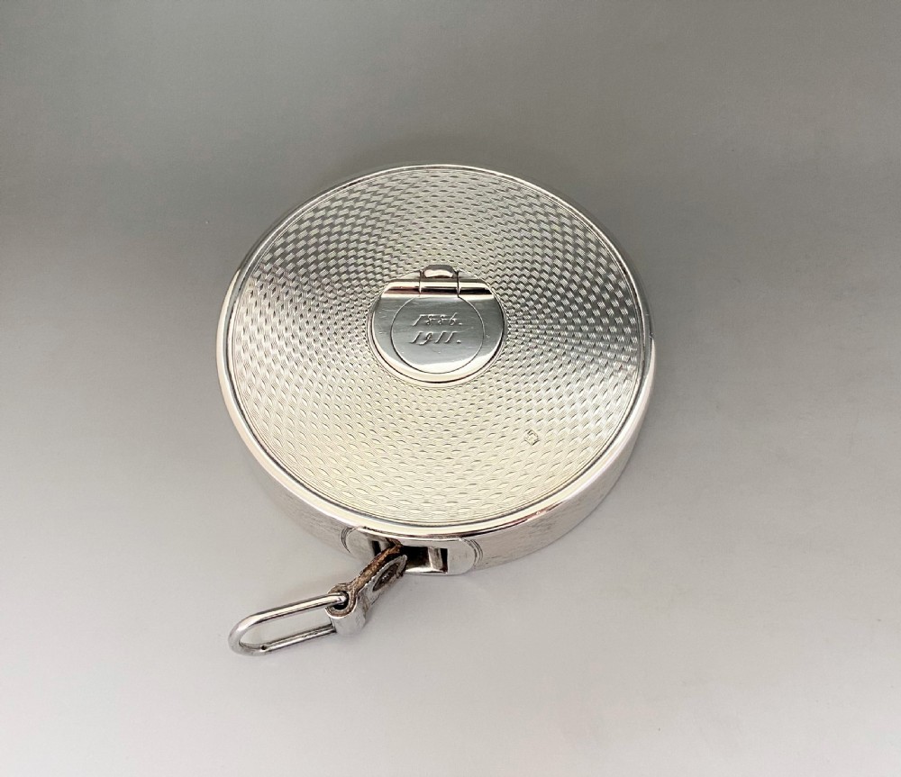 An exceptional silver cased Edwardian tape measure, with Spencer Family provenance