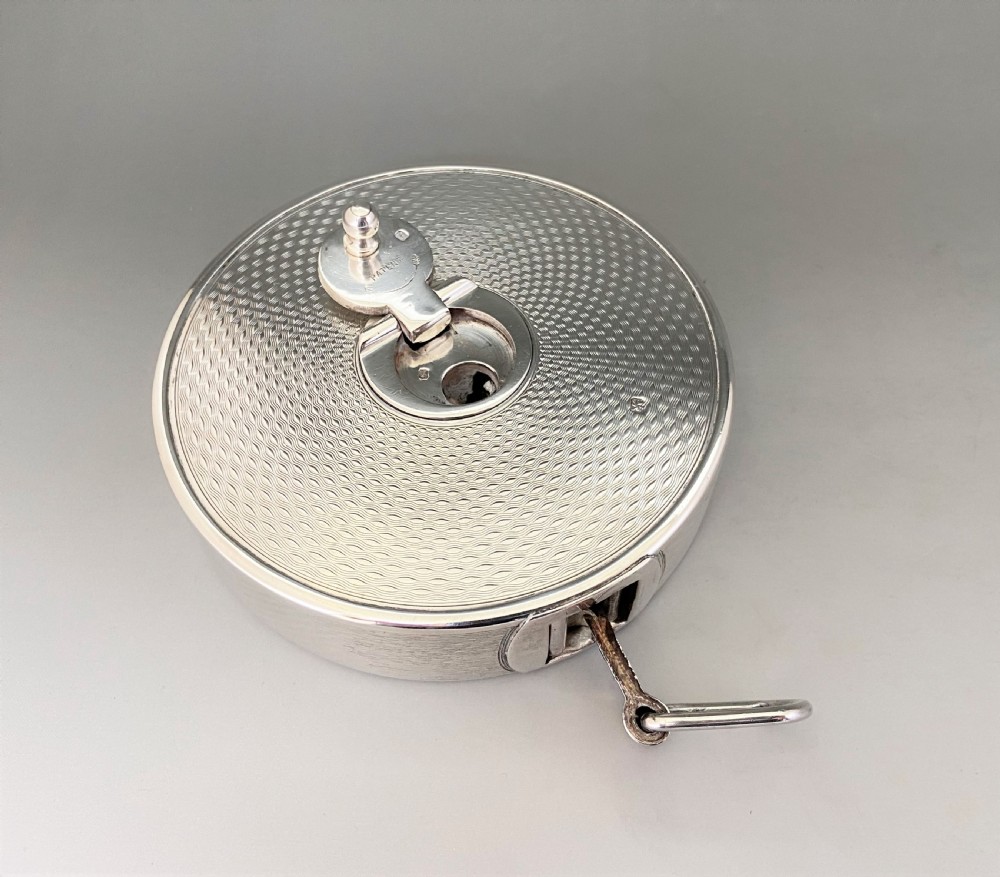 An exceptional silver cased Edwardian tape measure, with Spencer Family provenance View IV