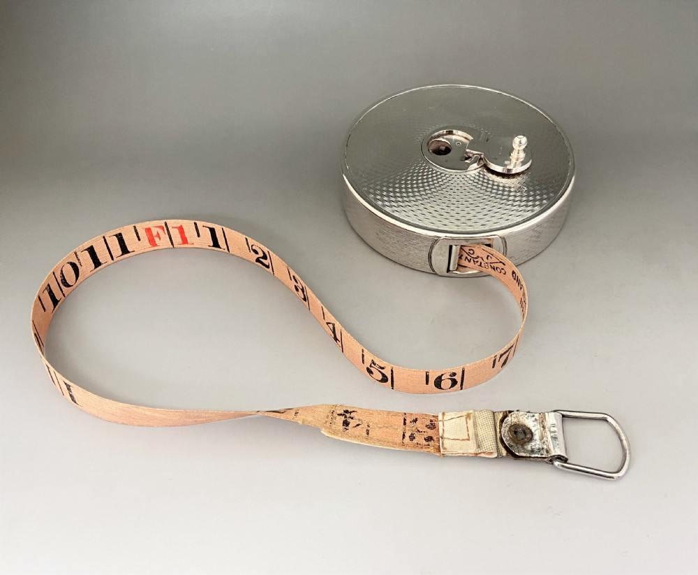 An exceptional silver cased Edwardian tape measure, with Spencer Family provenance View VI