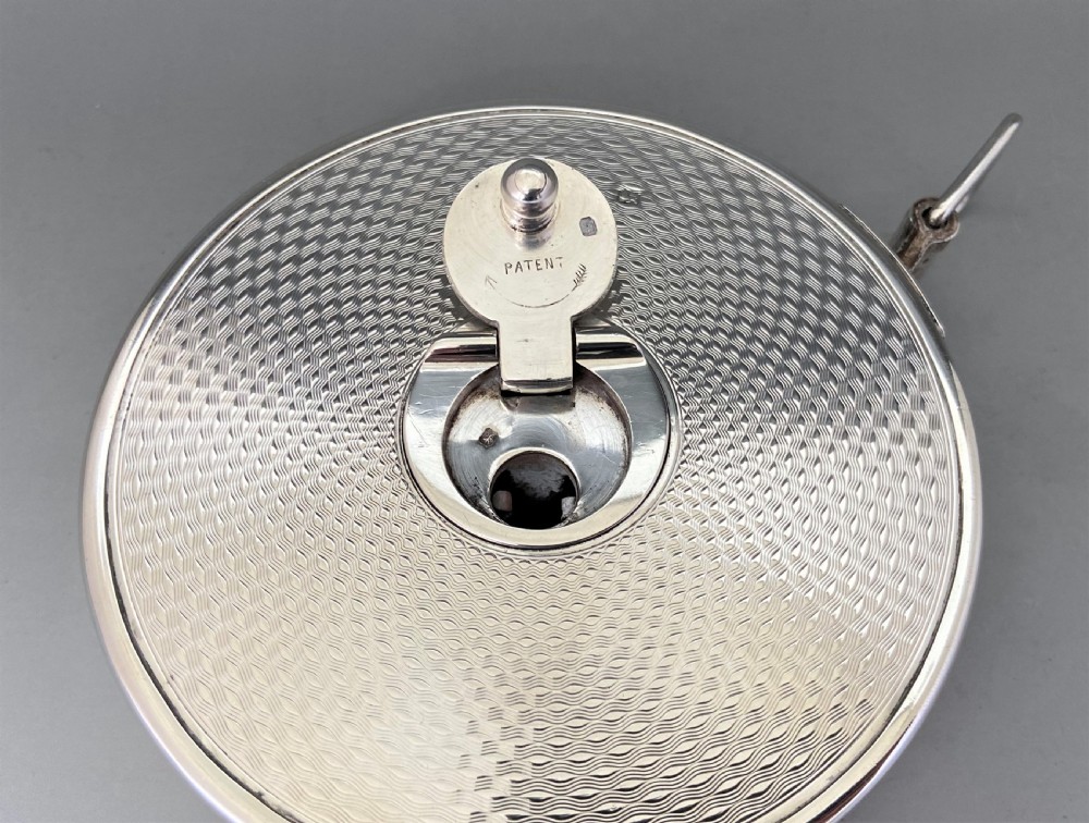 An exceptional silver cased Edwardian tape measure, with Spencer Family provenance View IX
