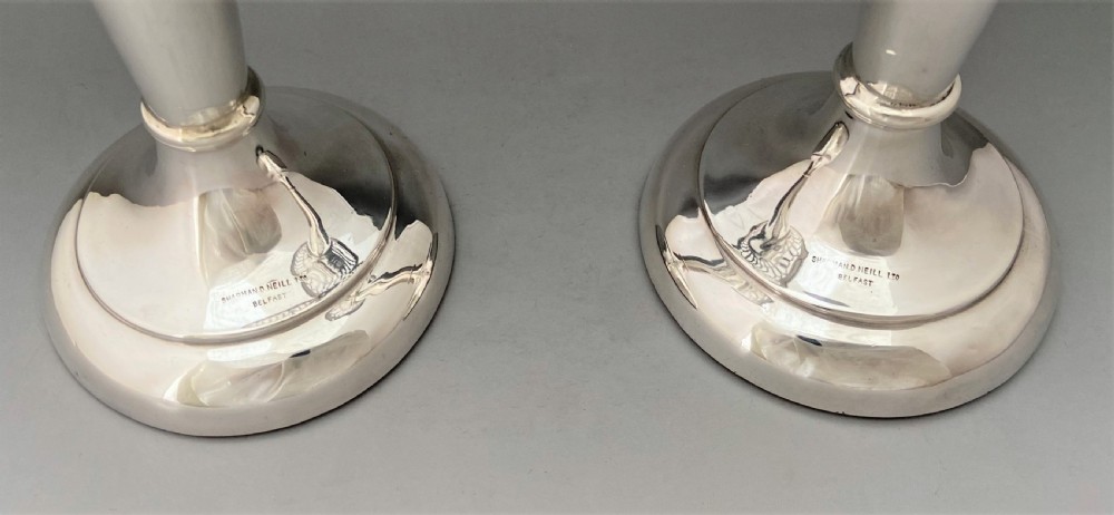 A fabulous pair of large Edwardian silver vases with a Belfast maker View VI