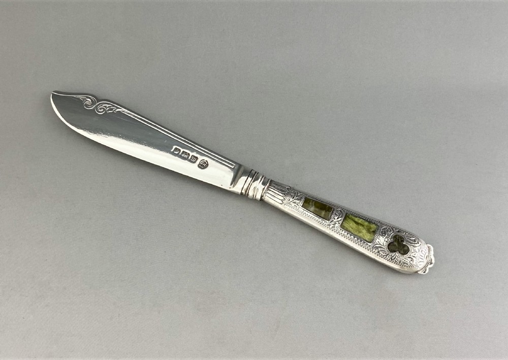 A superb silver butter knife with Connemara marble handle