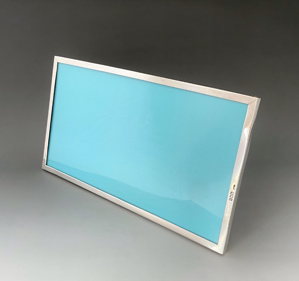 A desirable Edwardian silver landscape photo frame