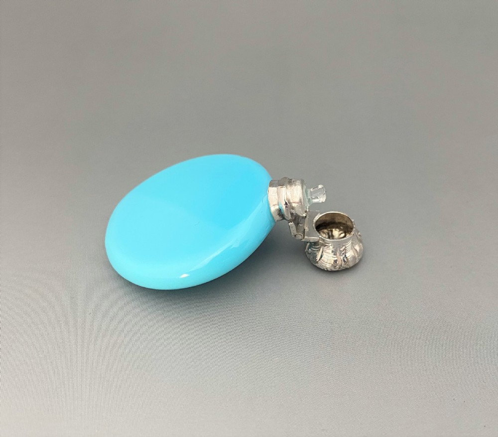 A Victorian silver mounted blue opaline 'penny' scent bottle View III