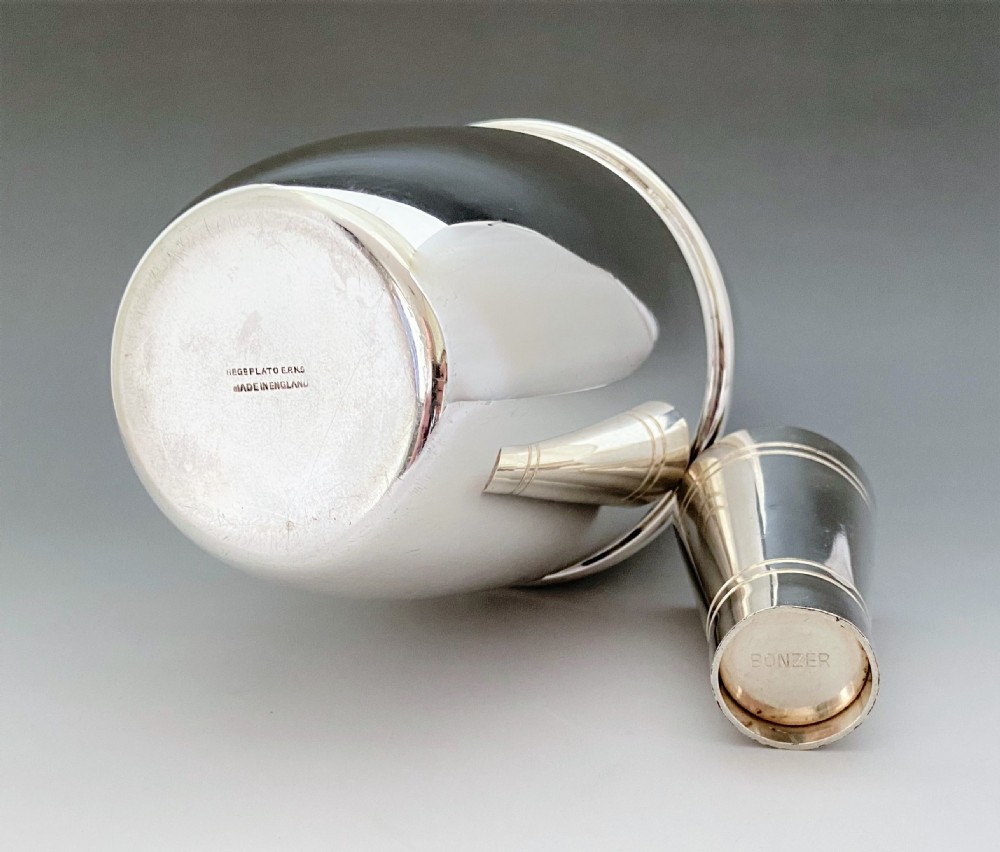 An Art Deco Silver Plated Cocktail Shaker & Measure View IV