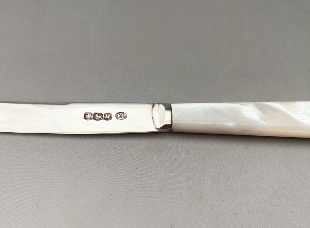 A charming Edwardian silver butter shell & Mother of Pearl knife View VII