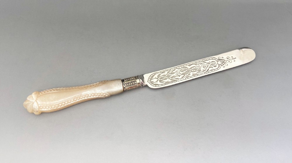 A lovely Victorian silver & mother-of-pearl butter knife