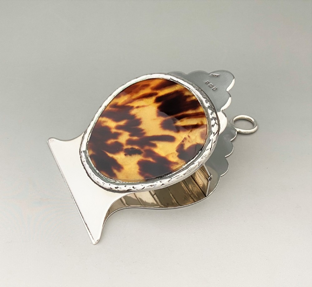 A striking Edwardian silver & tortoiseshell desk clip