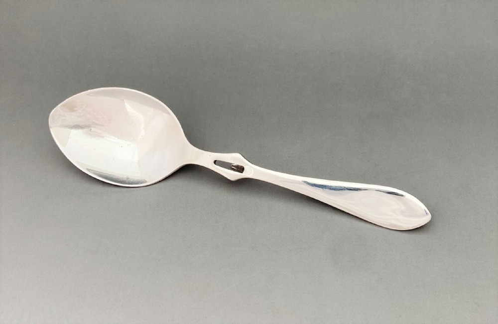 A Desirable Silver Honey Spoon