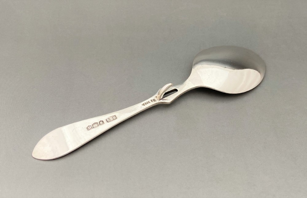 A Desirable Silver Honey Spoon View II