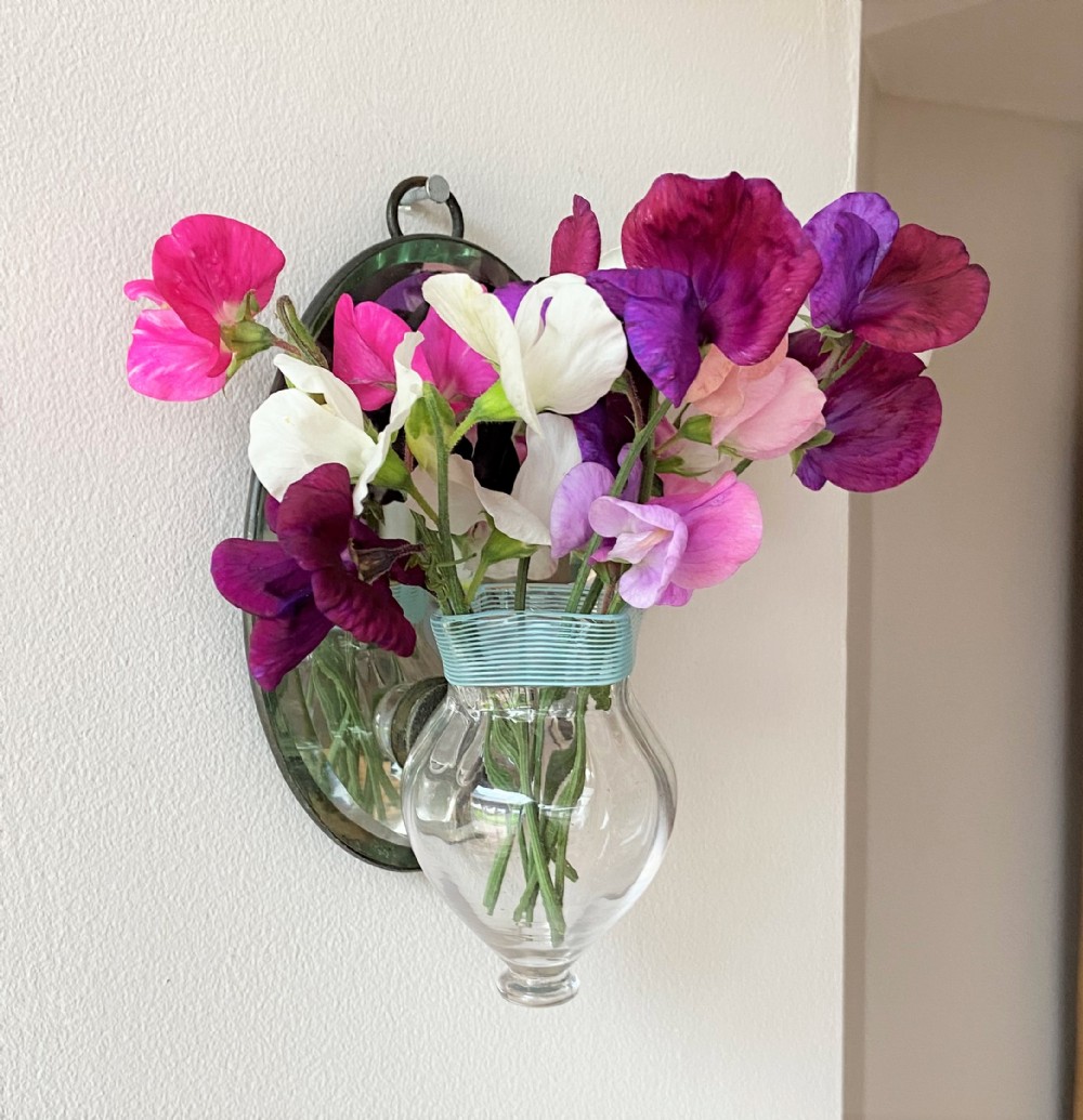 A rare Victorian wall mounted glass posy holder