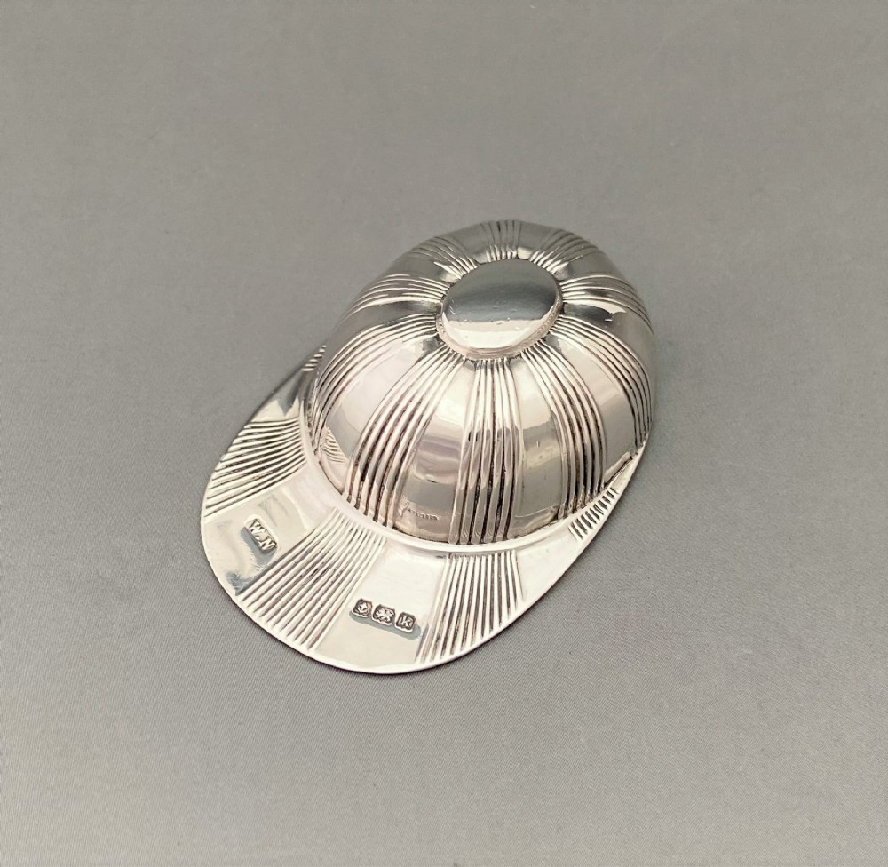 An Edwardian Novelty Silver Jockey Cap Caddy Spoon