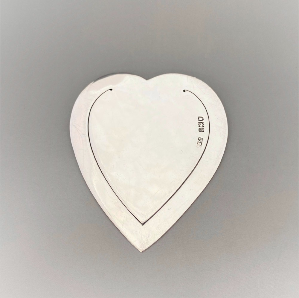 A large Edwardian silver heart shaped bookmark