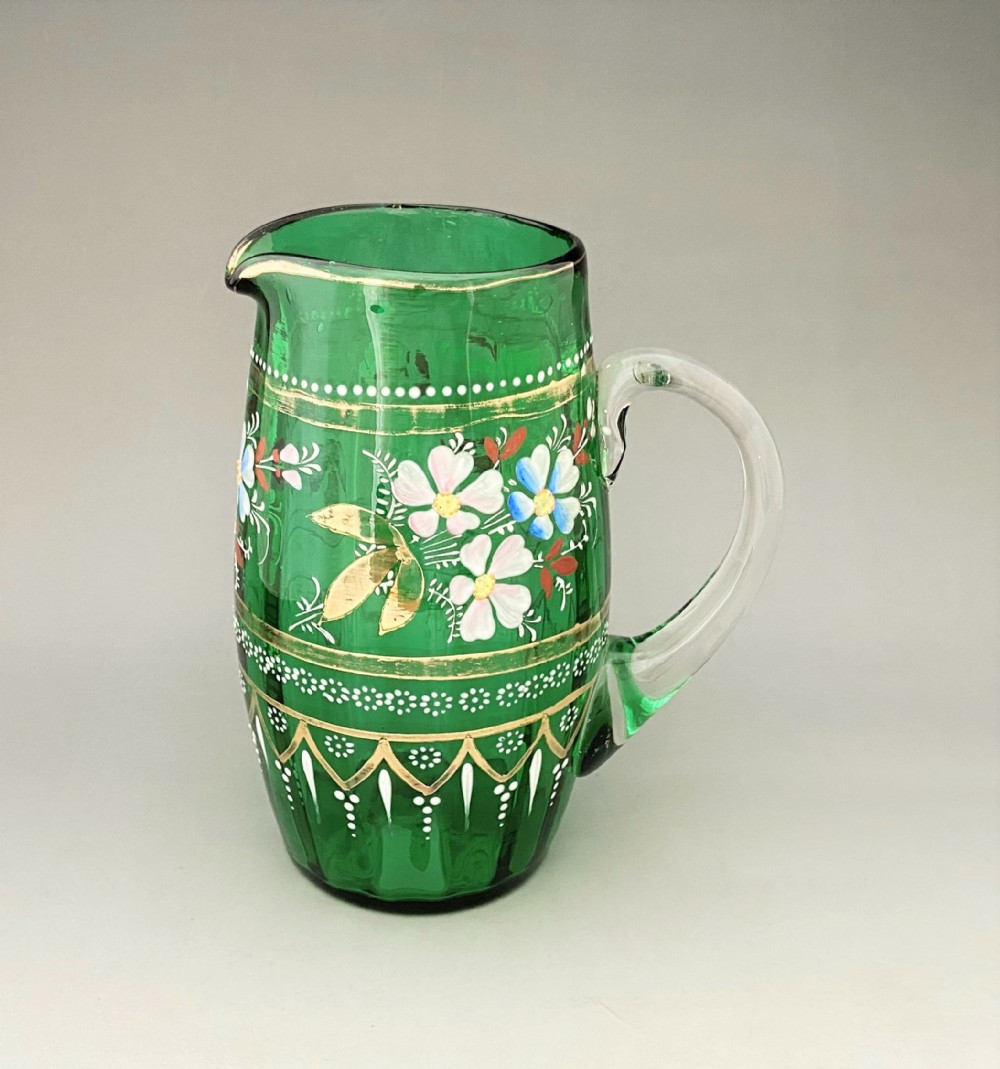 A lovely enamel painted & gilded Victorian glass jug
