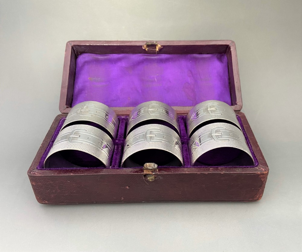 A desirable set of six boxed Victorian silver plated napkin rings View II