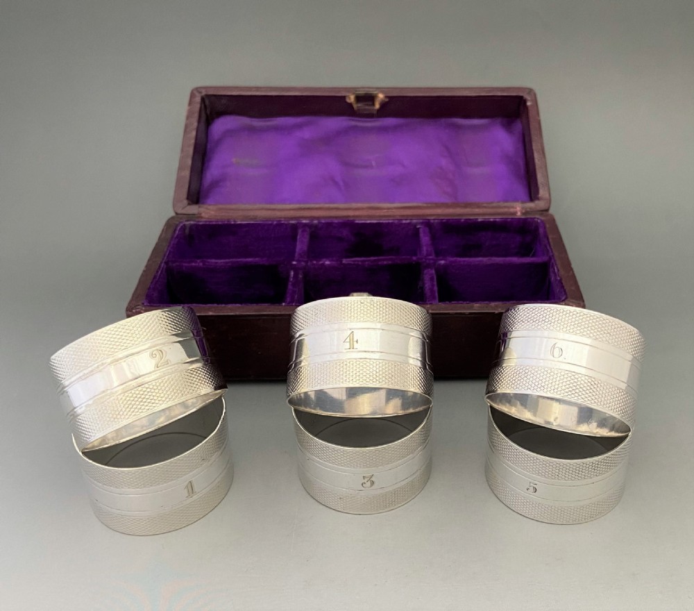 A desirable set of six boxed Victorian silver plated napkin rings View V