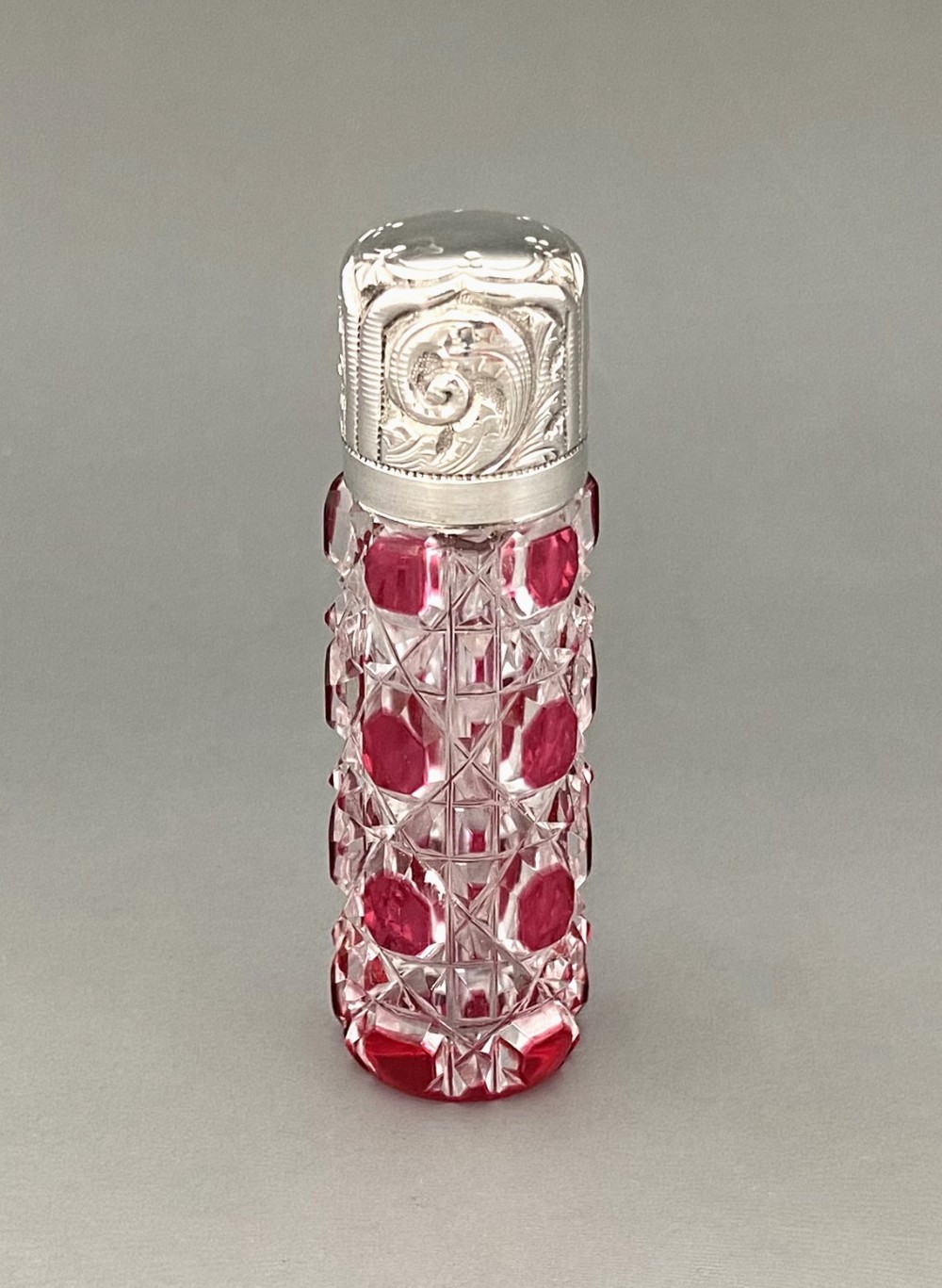 An attractive Victorian silver mounted scent bottle